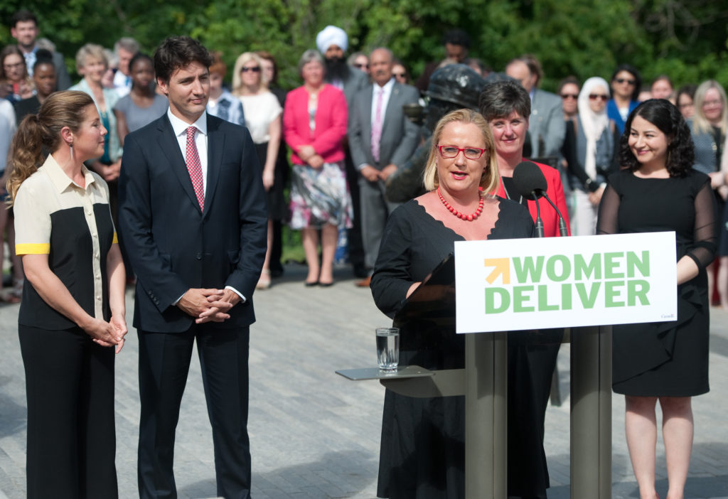 Sophie Grégoire, Justin Trudeau, Marie-Claude Bibeau and Maryam Monsef listening to Katja Iversen announcing that the Women Deliver 2019 Conference will be in Vancouver